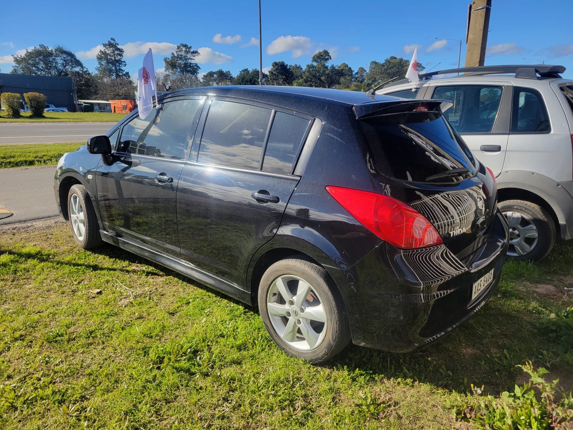 Nissan Tiida 2012 — foto 2